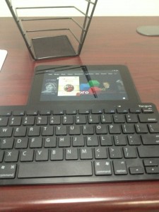 picture of a bluetooth keyboard hooked up to a Kindle Fire tablet sitting on a desk