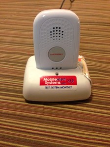 picture of a base with a device similar to the size of a small wireless home phone