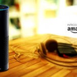 picture of a wooden table with headphones and an amazon speaker - the echo sitting on it