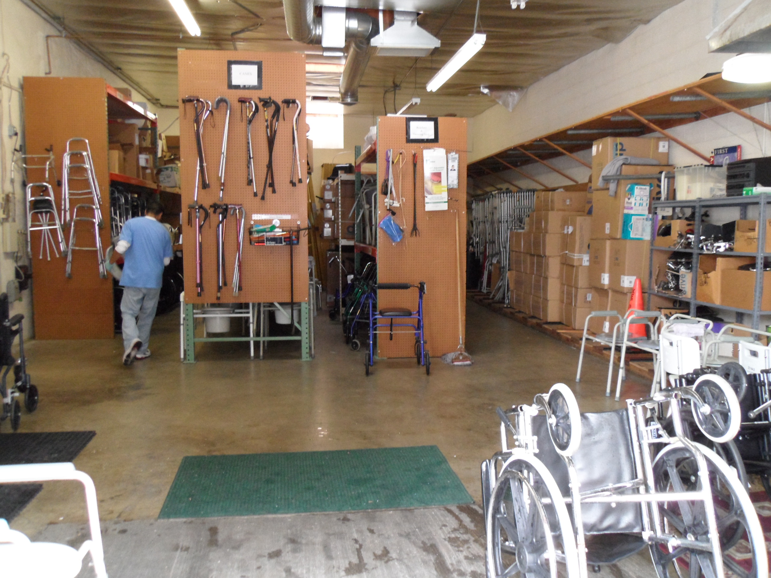 A photo of a large storage space with lots of gently used medical equipment waiting to be given out and reused. 