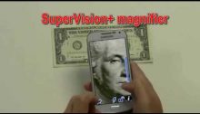 Hands holding SmartPhone to take a photo of a one dollar bill. Text: SuperVision+ Magnifier