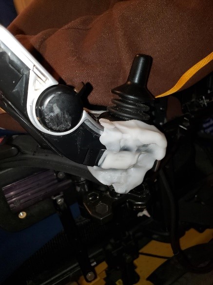 Powerchair controller repaired with moldable plastic