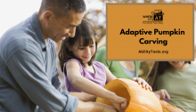 A adult assists a child with scooping the guts from a pumpkin. Under the Where it's AT logo, the text reads Adaptive Pumpkin Carving - abilitytools.org