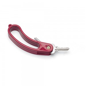 large red plastic oblong key holder with 2 keys on it