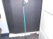 reacher grabber picture - blue and standing against the wall