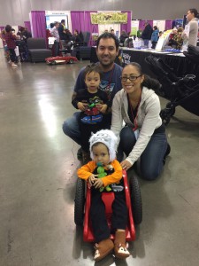 Photo of family with son using the ZipZac mobility Device