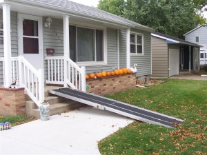 Portable Ramp extending from house front porch 