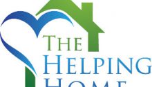 The helping home logo that have a green house over green and blue writing with a heart Incorporated in