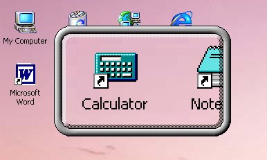 A pink desktop background. There are small icons seen on the desktop. There is a rectangular magnifying box over 'Calculator" showing that icon magnified. 