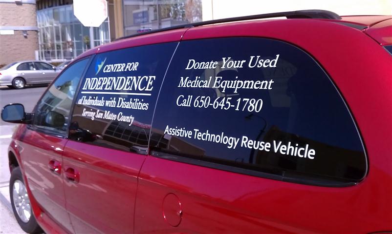 A photo of the CID van with contact information for their Reuse Program on the windows"
