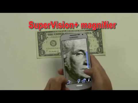 Photo of a person taking a cell phone photo of a dollar bill. The phone screen shows a large image of Washington's face.