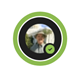 A Teams profile bubble with a green ring around it with the "Available"  icon in the bottom right corner.  The profile picture contains a man from the chest up, wearing a hat and a button up shirt, standing in front of the capitol.