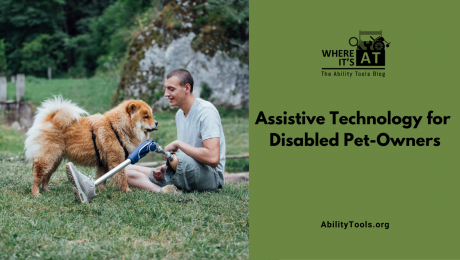 A young man with lower limb difference sits outside with a fluffy dog. Under the Where it's AT logo, the text reads Assistive Technology for Disabled Pet-Owners - abilitytools.org