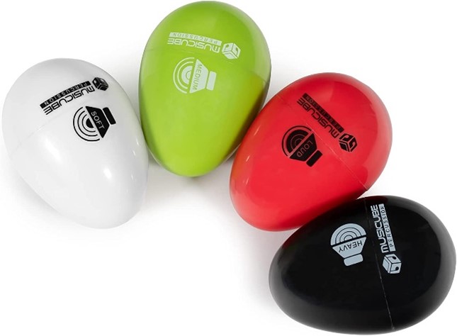A set of white, lime green, red and black egg shakers.