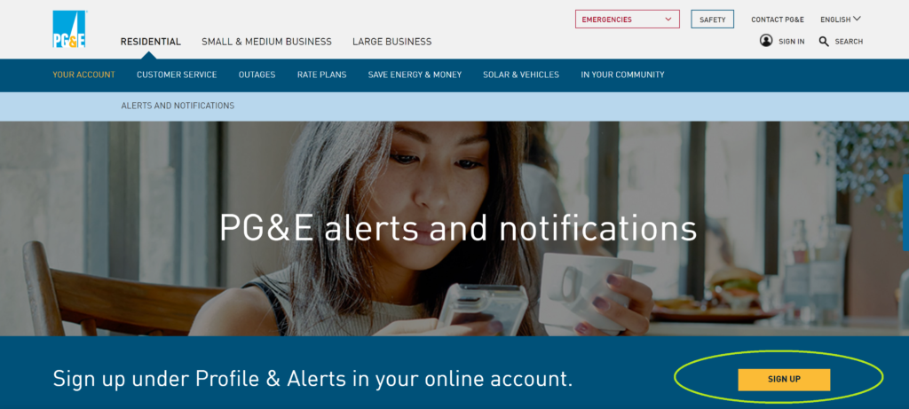 Screenshot of PG&E's Alerts and Notifications page. In background, a  woman stares at a cell phone and holds a mug. At the bottom of the screenshot, a yellow "Sign Up" button is highlighted by a green circle.  